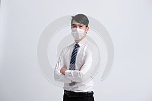 Businessman man wearing protective mask against cold flu virus bacteria infection pollution