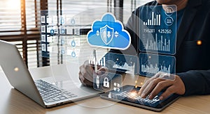 Businessman managing cloud data and security on digital devices