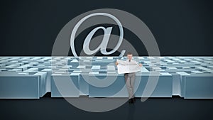 Businessman with Map trying to find his way in a Maze with Internet Mail Sign, dark room, stock footage