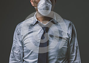 Businessman with mask and air pollution