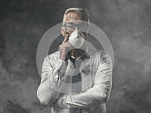 Businessman with mask and air pollution