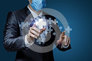 A businessman in a mask clicks on the plus icon on a blue background
