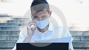 Businessman In Mask Speaks On Phone