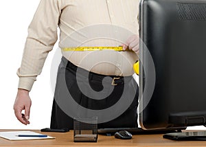 Businessman measures big waist by tape meter