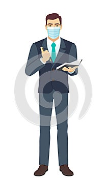 Businessman with medical mask with pen and pocketbook. Full length portrait of Businessman in a flat style