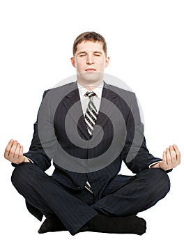 Businessman meditate , Isolated on white