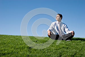 Businessman meditating