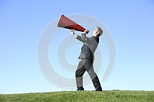 Businessman with megaphone