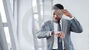 Businessman Missed Plane, Looking At Watch At Airport