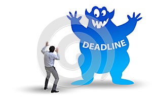 Businessman missing important deadline with monster photo