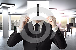 Businessman in modern office hides face behind sign exclamation mark 3D Illustration