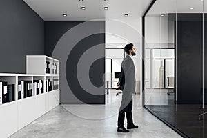 Businessman in modern office interior