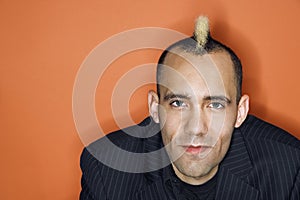 Businessman with mohawk. photo