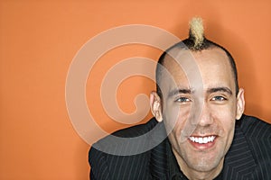 Businessman with mohawk. photo