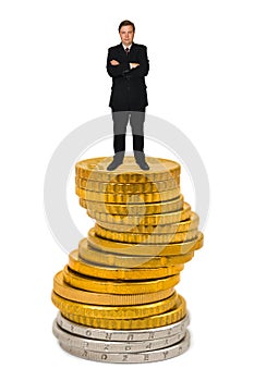 Businessman on money stack