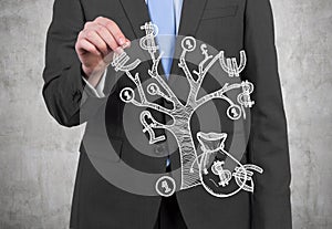 Businessman with money tree