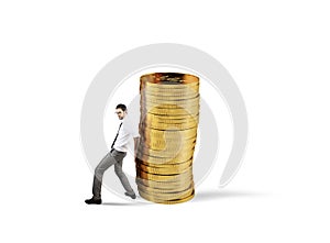 Businessman moves a pile of coins. concept of difficulty to saving money