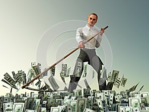 Businessman mowing scythe money photo