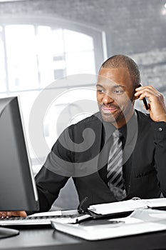 Businessman multitasking