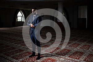 Businessman Muslim Praying in Mosque