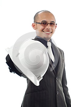 Businessman nand over the safety helmet