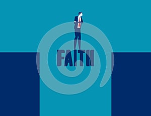 Businessman near and abyss standing on the word faith