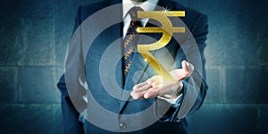 Businessman Offering A Golden Indian Rupee Symbol