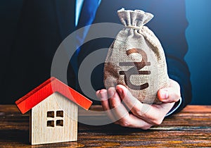 A businessman offers a loan to buy a house. Grants and financial assistance to rebuild and buy a home. Bank approval of a mortgage
