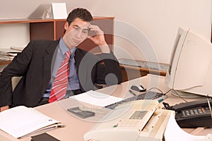 Businessman at office photo