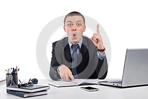 businessman at office holding finger up