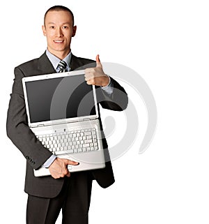 Businessman with open laptop shows welldone photo