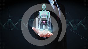 Businessman open palm, Zooming female body scanning womb, blue X-ray image.