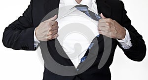 Businessman opening shirt