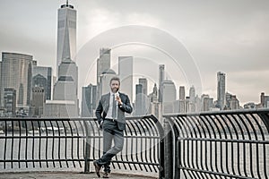 Businessman outdoor portrait. Middle age businessman in NYC. Mature senior man in 40s walk at Manhattan. Business