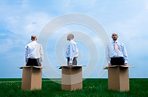 Businessman Outside The Box photo