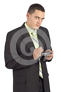 Businessman with palmtop / mobile - writting