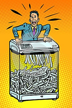 Businessman in paper shredder, office appliance. secret informat