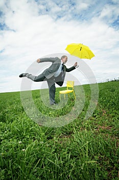 Businessman with parasol