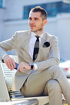 Businessman On Park Bench in the city