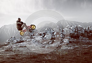 Businessman on a pedal car