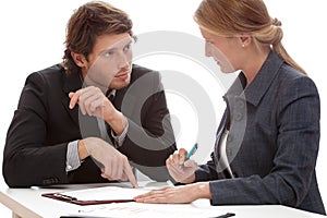 Businessman persuading to signing a contract photo