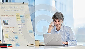 Businessman, phone call and statistics charts in office on whiteboard on laptop, financial or graphs. Male person, smile