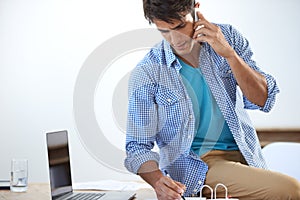 Businessman, phone call and writing with laptop for networking, communication or planning with documents. Person