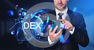 Businessman with phone, DEX hologram with blockchain and informa photo