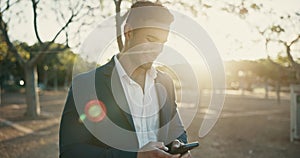 Businessman, phone and happy with typing outdoor for text message, mobile chat and communication with lens flare