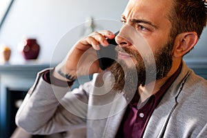 Businessman on the phone receiving bad news. Business, stress work concept