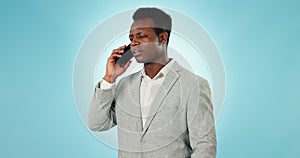 Businessman, phone and sad communication in studio for networking, discussion or conversation on blue background. Mobile