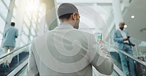 Businessman, phone and travel on escalator at airport for online booking, flight time or boarding. Rear view of man