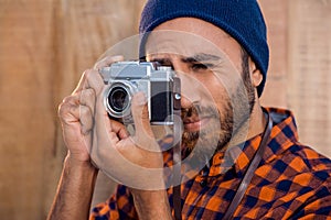 Businessman photographing through camera