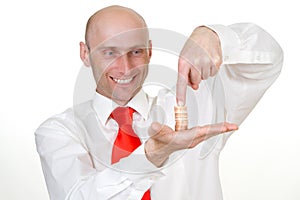 Businessman with pile of coins